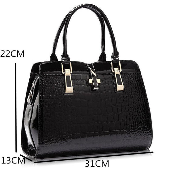 Stylish MONO//FIT luxury women's handbags in black with textured finish and elegant design