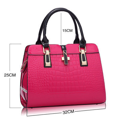 MONO//FIT luxury women's handbags in pink with crocodile texture and stylish handles