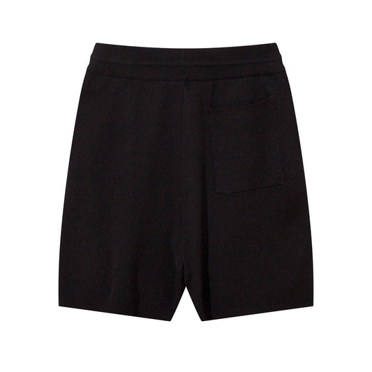 Luxury wool shorts for men in black with a sleek design and back pocket