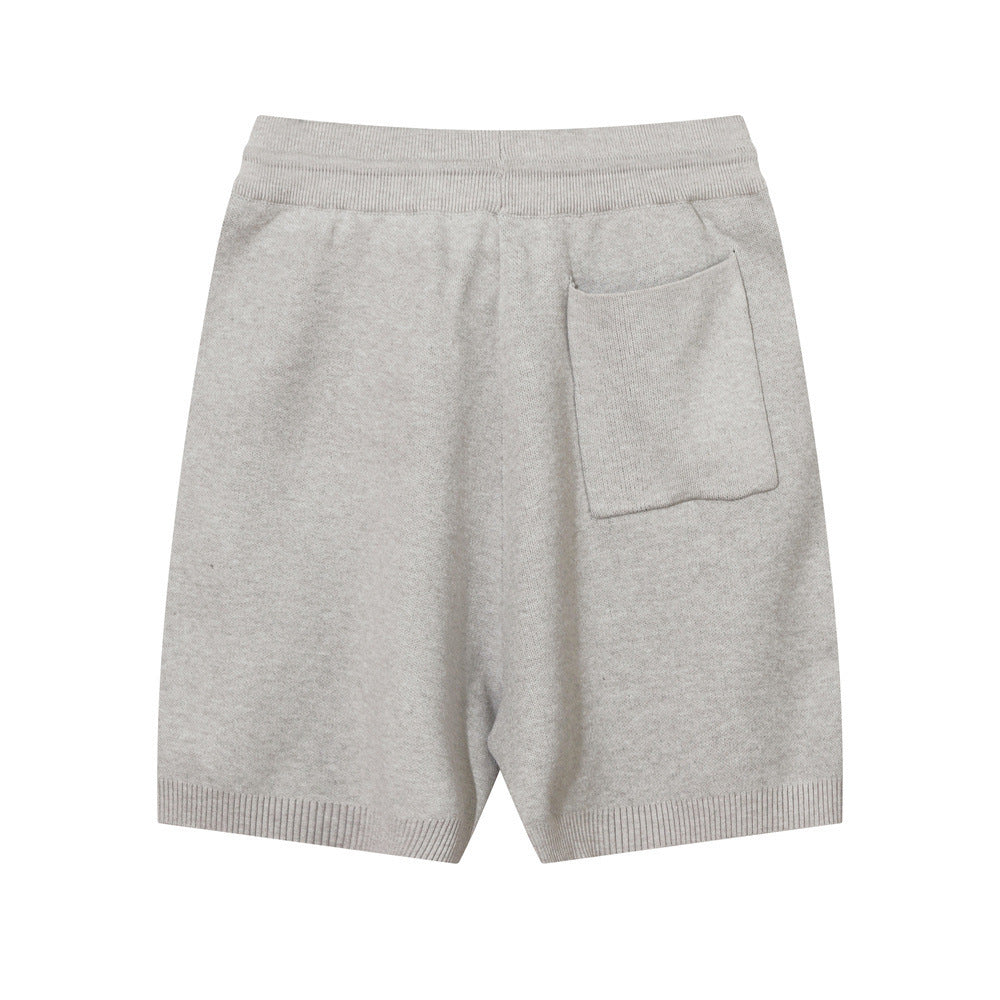 Gray MONO//FIT luxury wool shorts for men featuring a back pocket and elastic waistband
