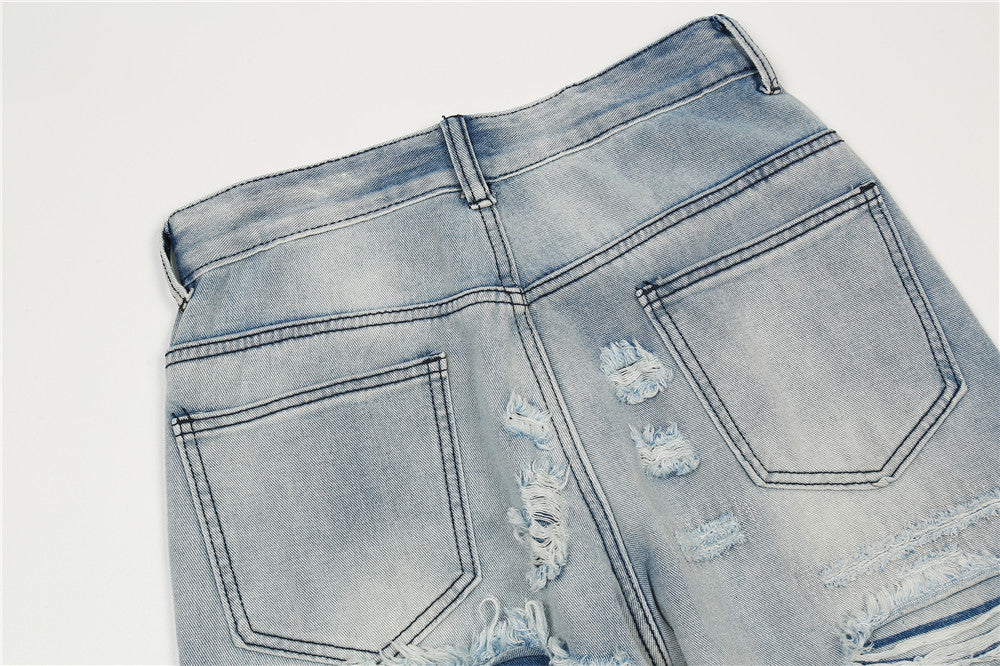 MONO//FIT men's flared jeans with distressed details and classic five-pocket design