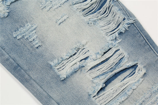 MONO//FIT men's flared jeans with distressed details and fraying for a trendy casual look