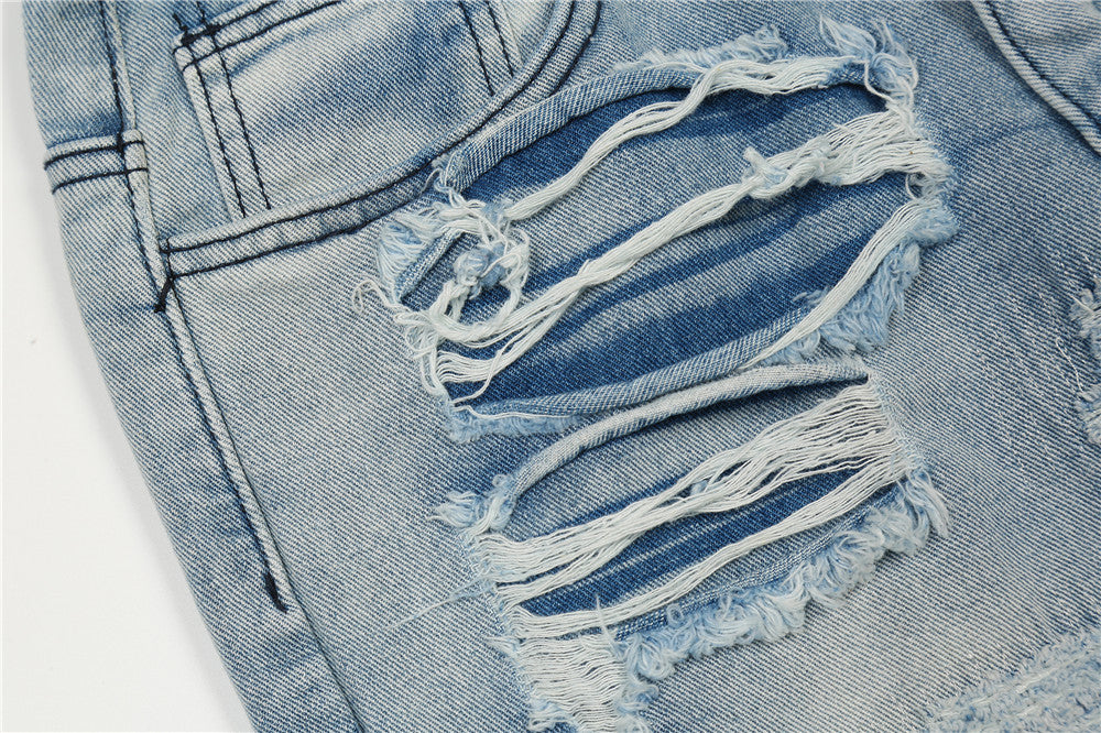 MONO//FIT men's flared jeans in light wash with distressed details and rips for a trendy look