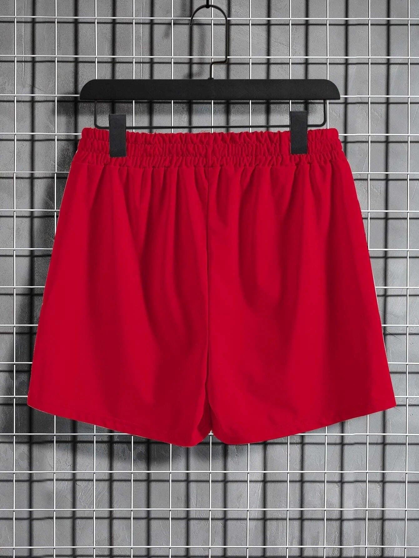 Men's printed bear shorts in vibrant red color, ideal for casual summer outings