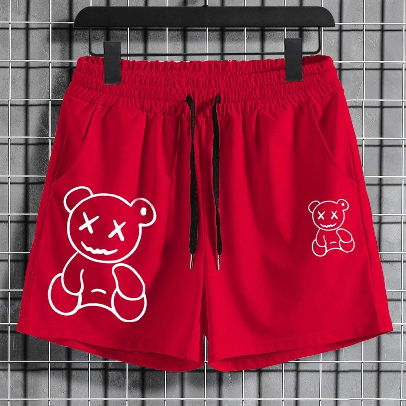 MONO//FIT men's printed bear shorts in vibrant red with unique bear graphic design