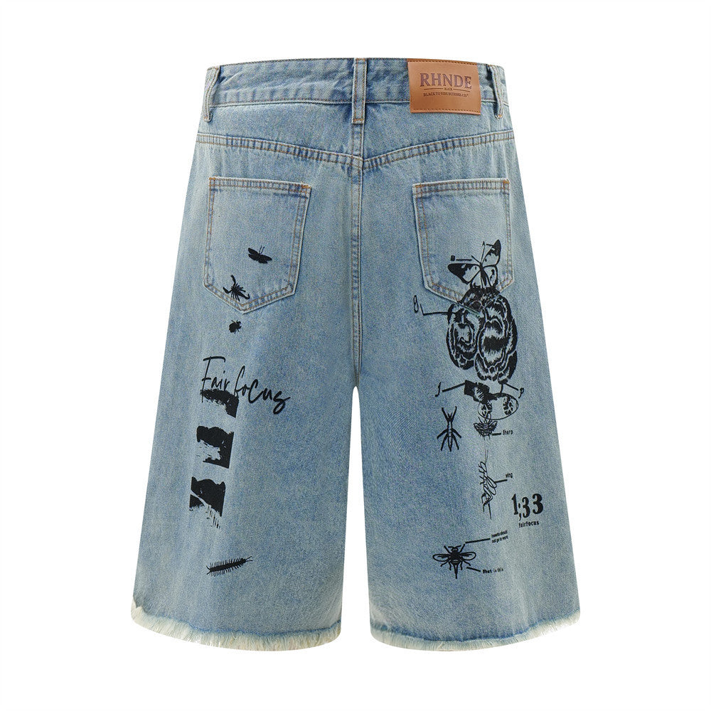 MONO//FIT men's printed denim shorts with unique graphic designs and a frayed hem for a trendy look