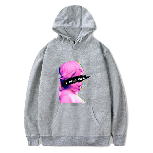 Gray minimalist men's hoodie featuring a vibrant graphic of a woman's profile with text