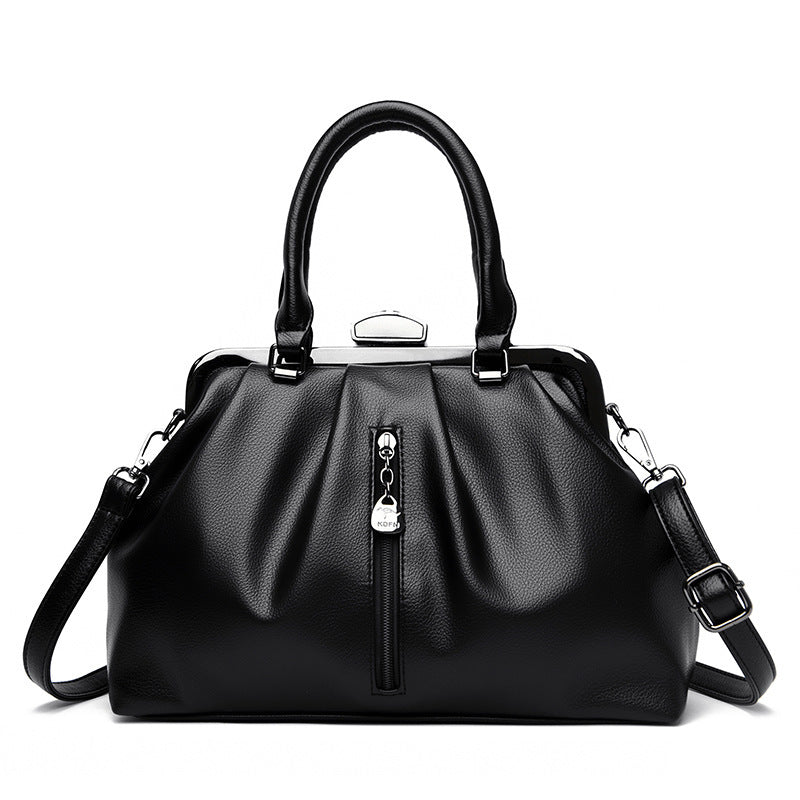 Stylish black minimalist women handbag with spacious design and adjustable shoulder strap