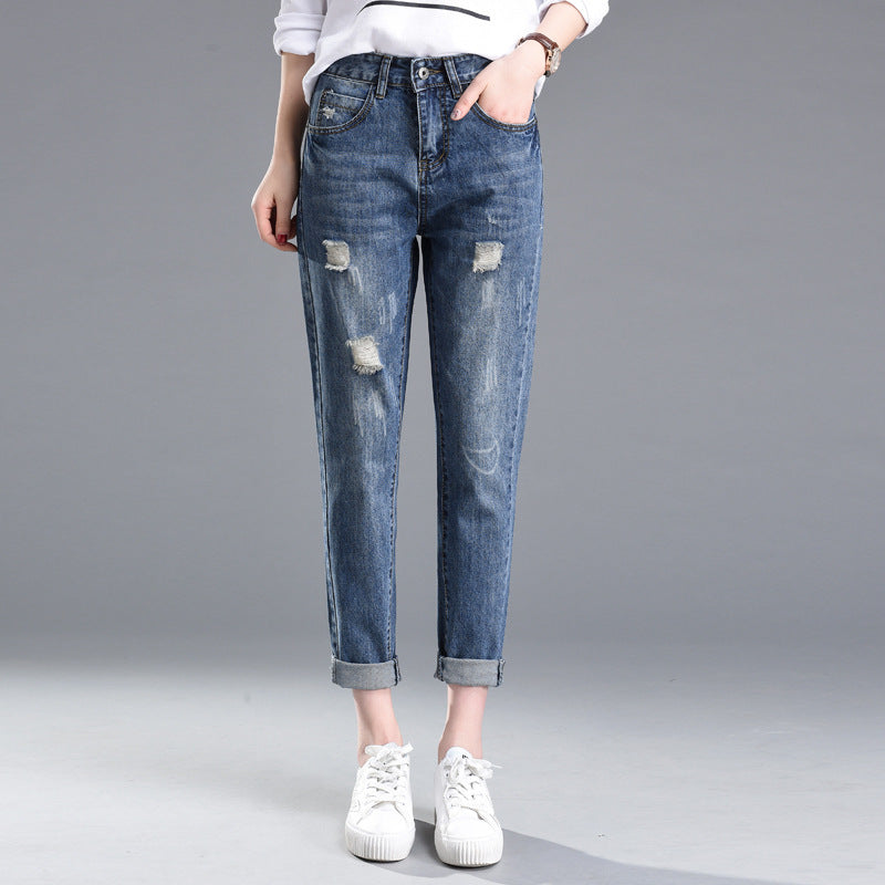 Stylish MONO//FIT ripped jeans for women in light blue with distressed detailing and rolled cuffs