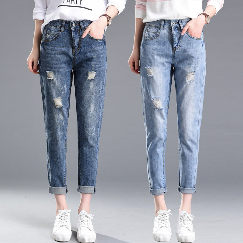 Casual ripped jeans for women with stylish distressed detailing and a comfortable fit
