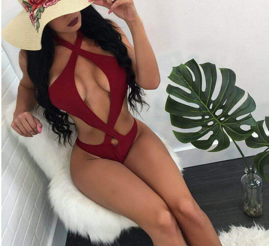 Stylish MONO//FIT sexy halter bikini swimwear in red with unique cutout design and a wide-brimmed hat