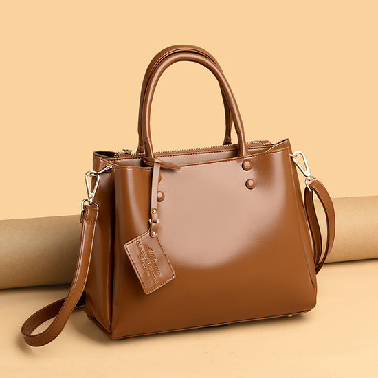 MONO//FIT simple design tote bags in brown with zipper closure and detachable strap