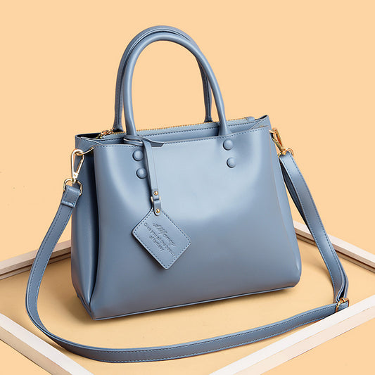 MONO//FIT simple design tote bags in light blue with dual handles and adjustable strap