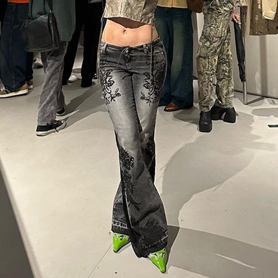 MONO//FIT Slimming jeans for women in black with floral design and flared fit for a stylish look