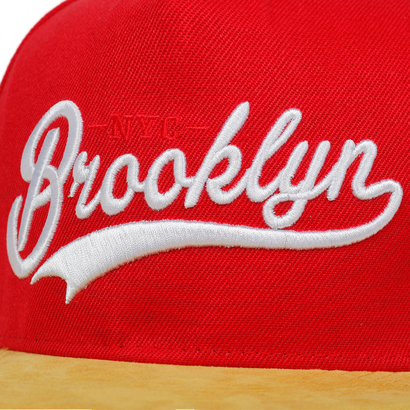 Red Brooklyn sport cap for men with stylish white embroidery and a sleek design