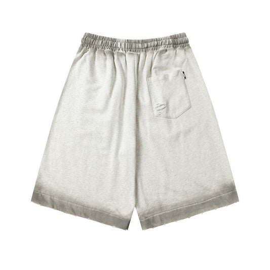 MONO//FIT spray paint style shorts in light gray with an elastic waistband and casual fit