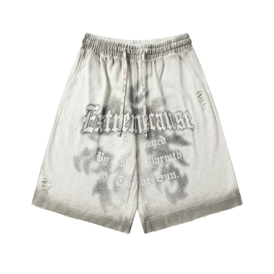 MONO//FIT spray paint style shorts featuring a comfortable elastic waistband and unique graphic design