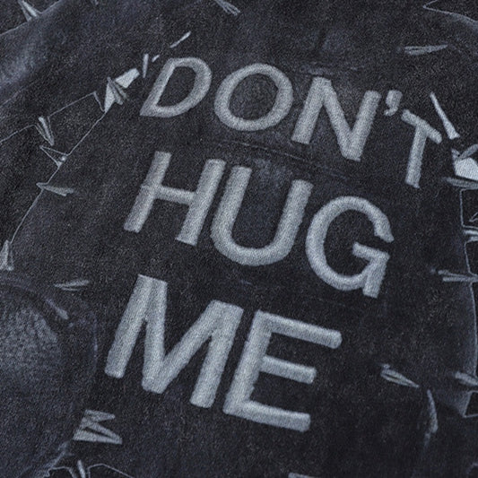 MONO//FIT streetwear bear graphic tee featuring the phrase Don't Hug Me on a dark background