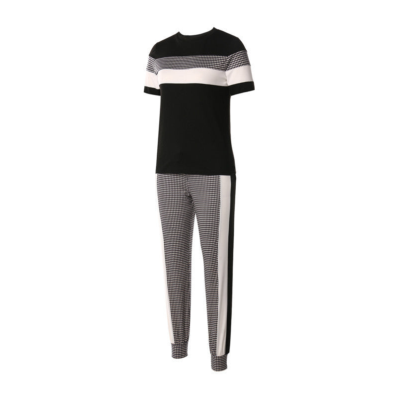 MONO//FIT women's fashion sets featuring a stylish black and white two-piece outfit with sporty stripes