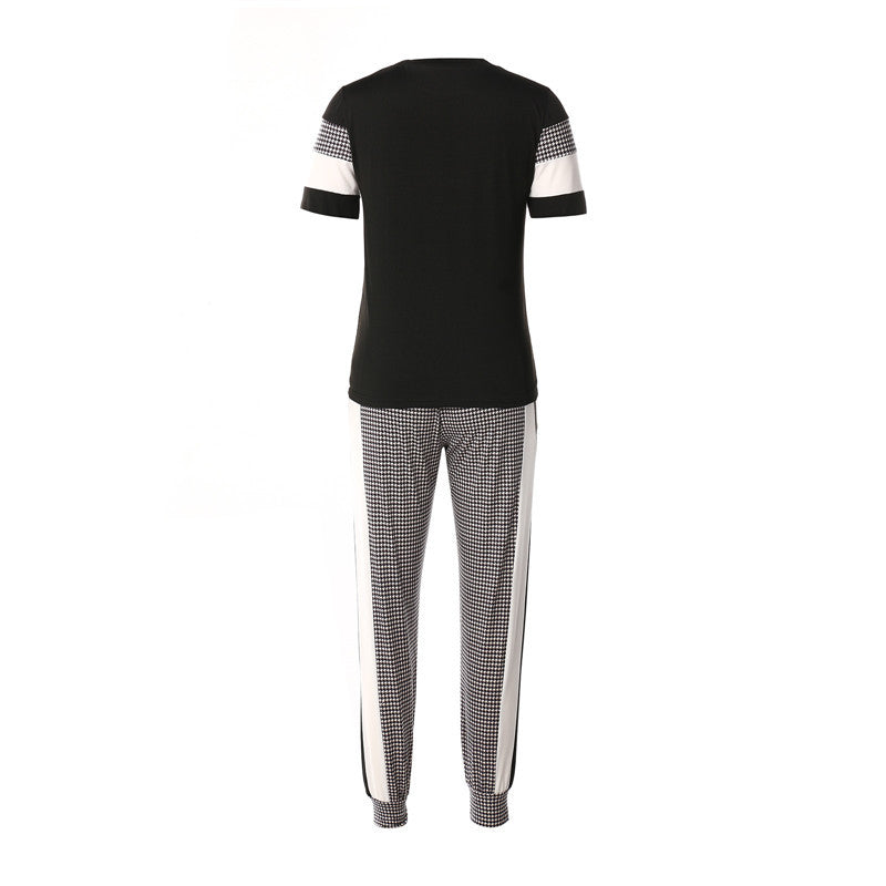 MONO//FIT women's fashion sets featuring a stylish black top and patterned pants with side stripes