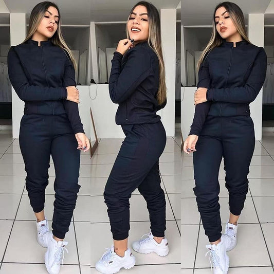 MONO//FIT women's fitness twinset in black with zip-up jacket and matching pants for stylish workouts