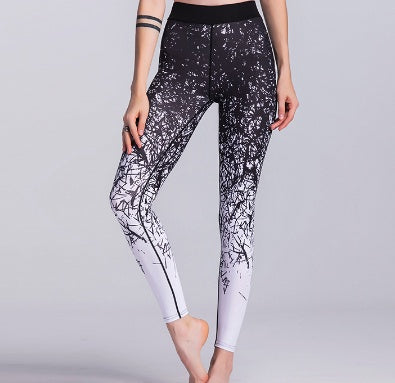 Stylish women's fitness yoga pants with a unique black and white tree design for active wear