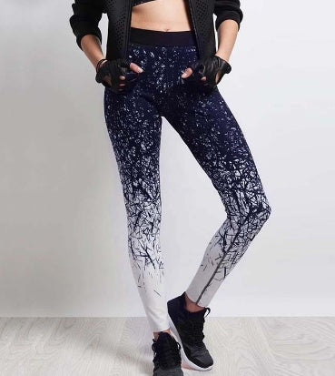 Stylish women's fitness yoga pants with a trendy ombre design and pockets for active wear